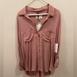 Woman’s rose color long sleeve blouse